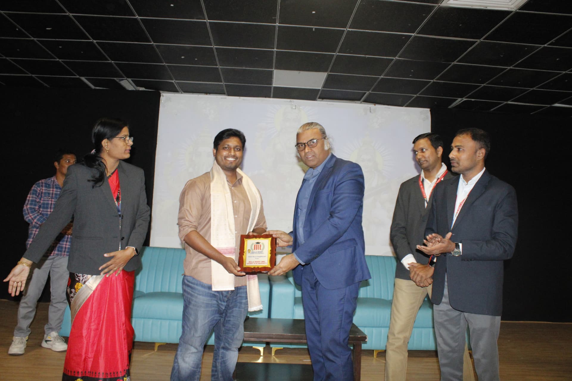 Velamarthy Gopichand and attendees during the on-stage presentation