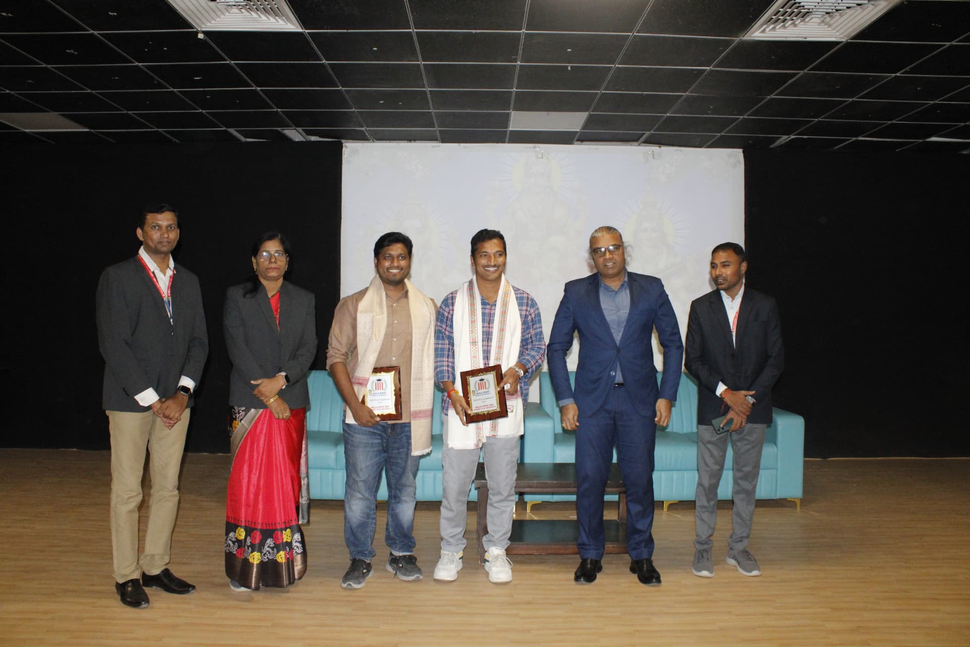 Navaneeth Reddy and Velamarthy Gopichand with college event attendees